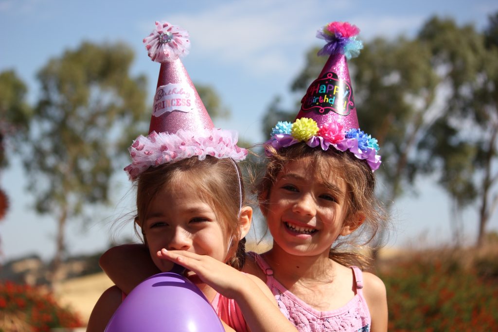 kids with birthday hats